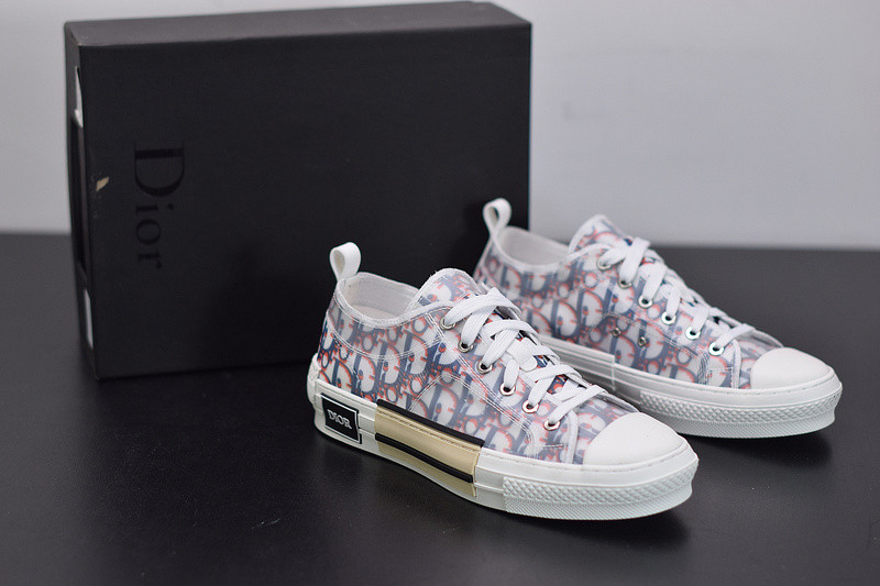 dio* b23 low-top sneaker in blue & red oblique